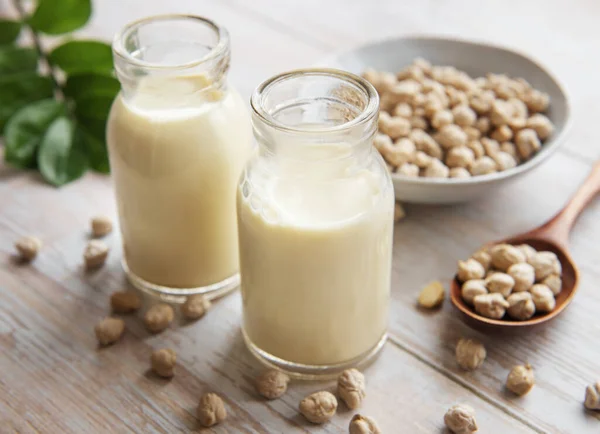 Chick peas milk with chick peas on the table