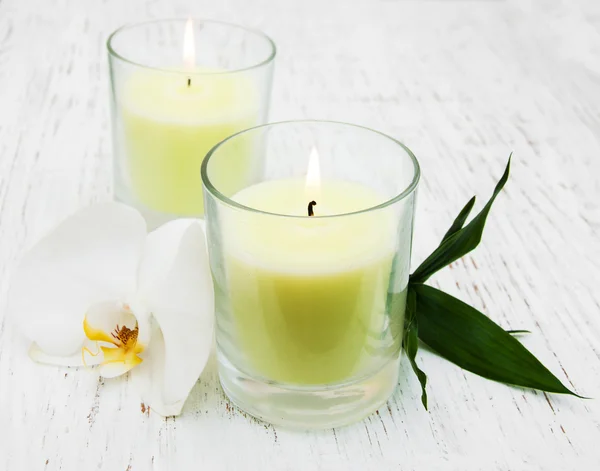 Candles and orchid — Stock Photo, Image