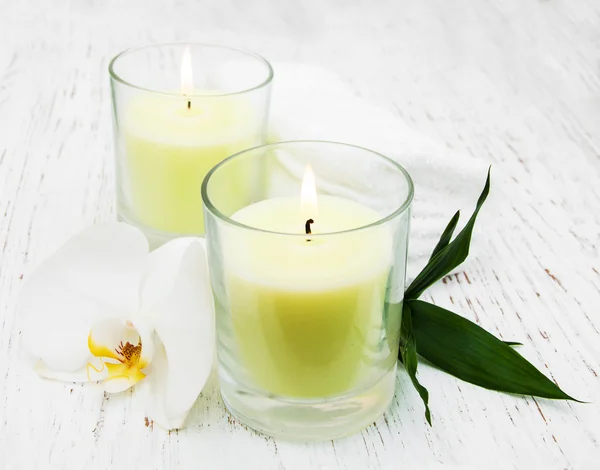 Candles and orchid — Stock Photo, Image