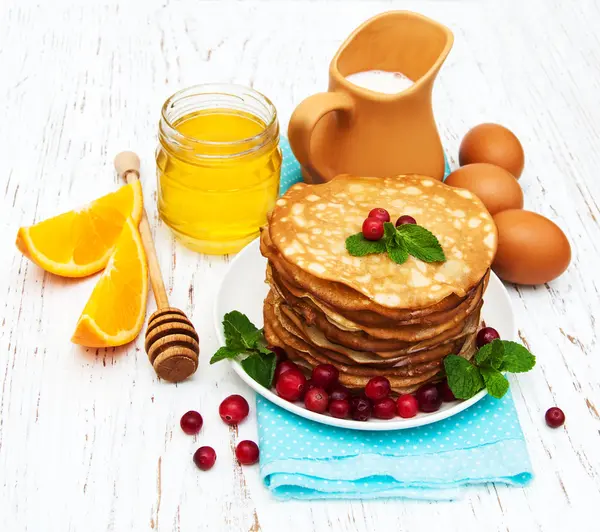 Pancakes with cranberries — Stock Photo, Image