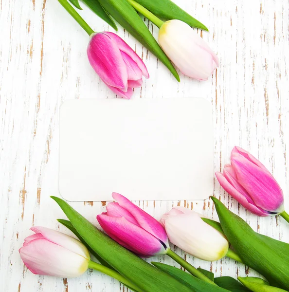 Tulips with a card — Stock Photo, Image