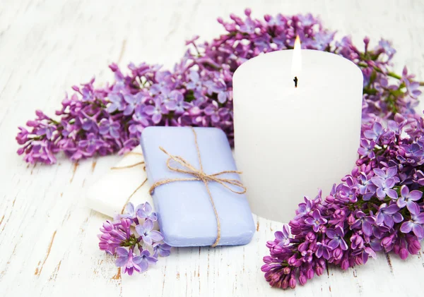 Natural soap and lilac flowers — Stock Photo, Image