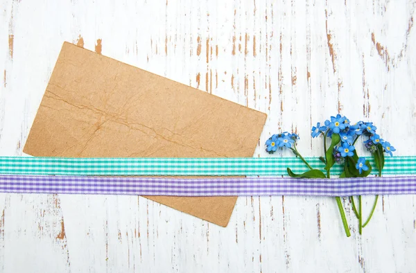 Forget-me-nots flowers with card — Stock Photo, Image