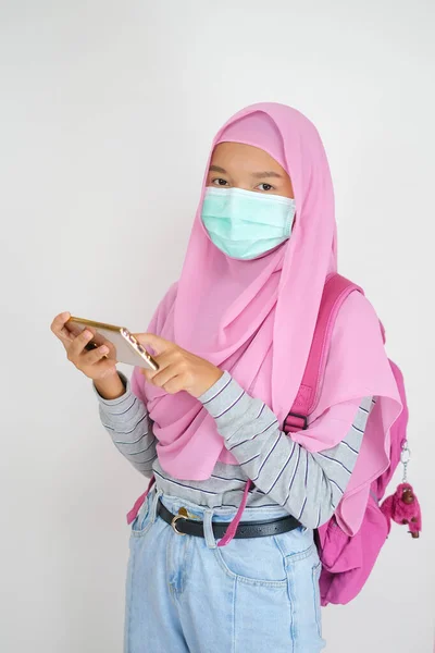 Student Young Girl Uses Mobile Phone Wear Mask White Background — Stock Photo, Image