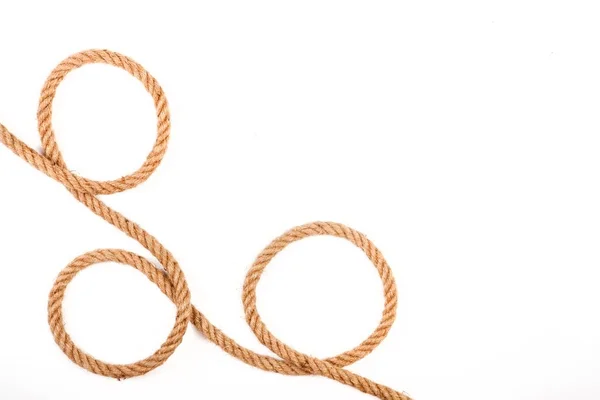 Knoten aus einem Seil auf weißem Hintergrund — Stockfoto