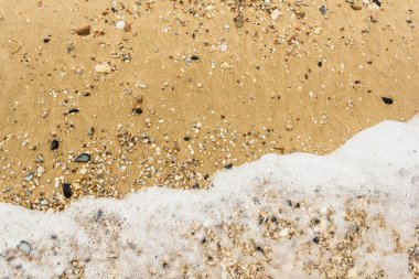 Dalga deniz kumlu plaj arka plan üzerinde yumuşak