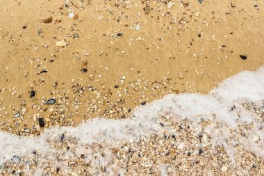 Dalga deniz kumlu plaj arka plan üzerinde yumuşak