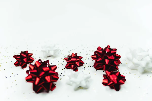 Weihnachten Hintergrund Mit Roten Und Weißen Schleifen Und Glitzern — Stockfoto