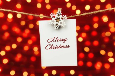 Noel tebrik kartı arka planda.