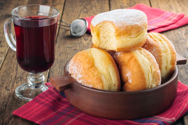 Sugary donuts and hibiscus red tea — Stock Photo, Image