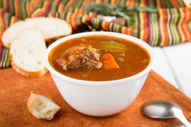Beef stew with vegetables. Goulash soup.  clipart