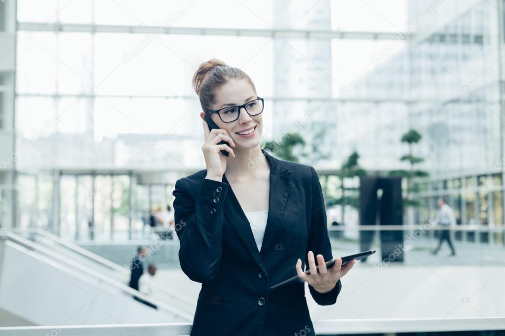 Businesswoman using a mobile phone