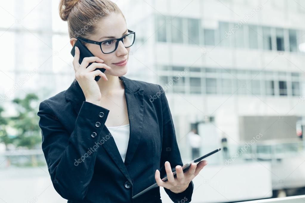 Businesswoman using a mobile phone