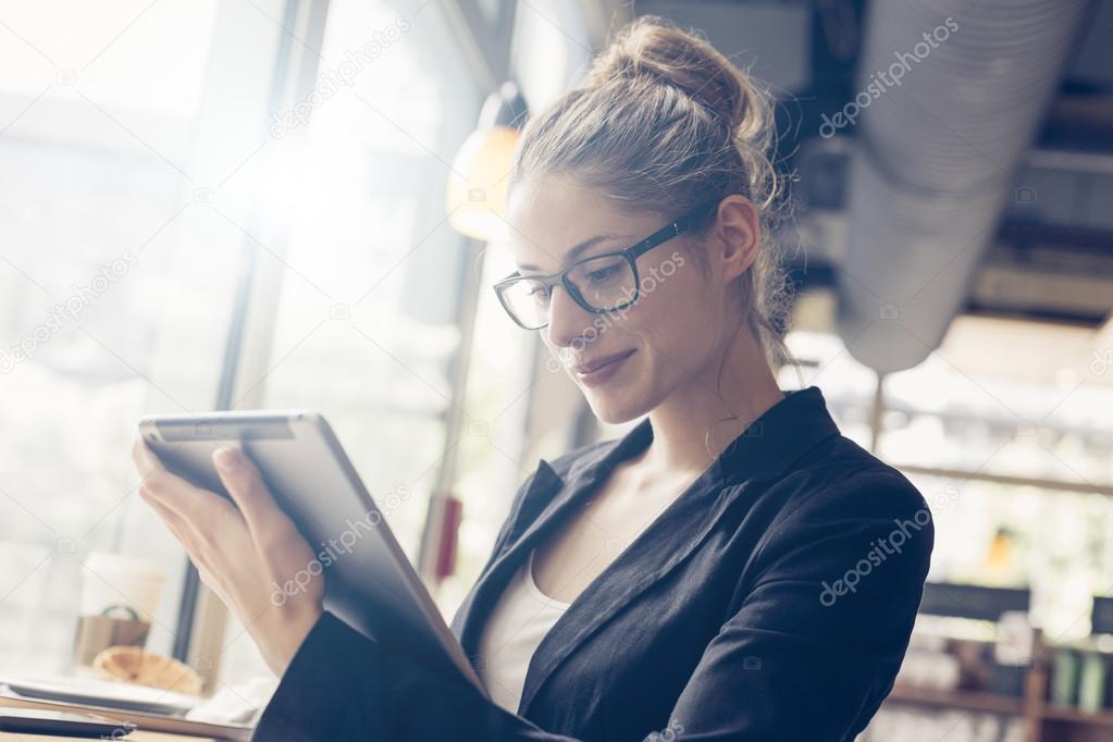 Businesswoman using a digital tablet