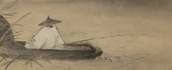 Bir tekne içinde Çinli balıkçı