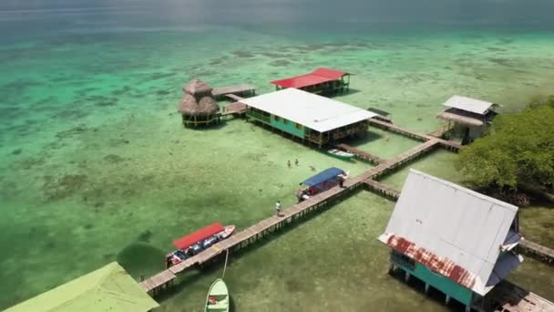 Aerial Drone Circular Shot Little Floating Colorful Houses Overwater Caribbean — Stock Video