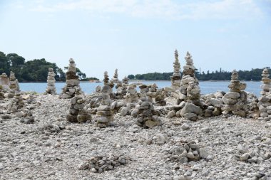 Steinmaennchen bir einer Kueste