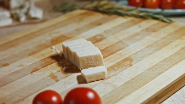 Gnocci with tomato sauce being sprinkled with Parmesan. Mix with a spoon. Pleasant atmosphere. 4k Video. — Stockvideo