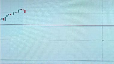 Screen with a stock market graphic. Cryptocurrency rate graphic showing data online. Timelapse