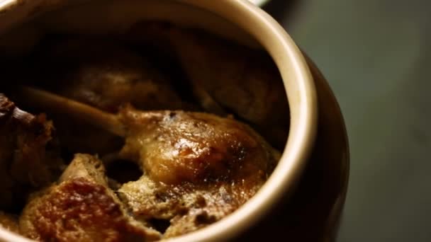 I put the duck pieces over the chickpeas. The duck gives steam and looks very appetizing. — Stock Video