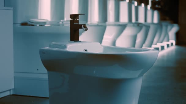 Rotating path. Studio filming. In the background a row of toilets. 4k video — Stock Video