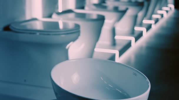 Rotating washbasin. Studio filming. In the background a row of toilets. 4k video — Stock Video