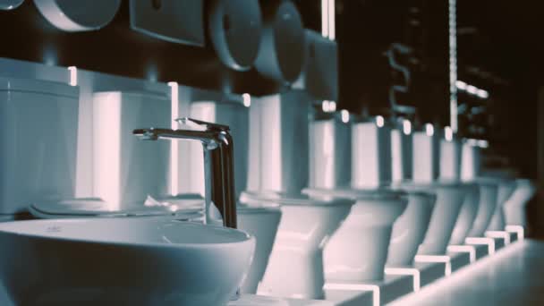 Rotating washbasin. Studio filming. In the background a row of toilets. 4k video — Stock Video