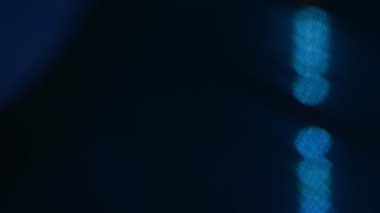 Işık yansımalı vinil bir diskin makrosu, bokeh.