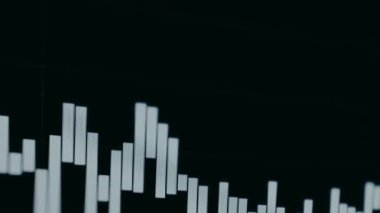 Koyu arkaplana karşı gösterilen çubuk grafiği.