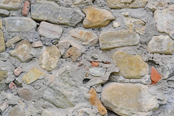 Contexto. Parede montada de pedras — Fotografia de Stock