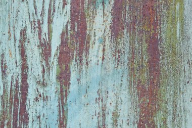 Renkli, paslı metal paneli. Arka plan