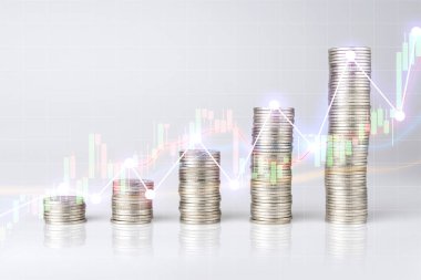 Forx ticaret grafikleri ile istiflenmiş gümüş sikkeler, fon için finansal yatırım fikirleri kullanılır.