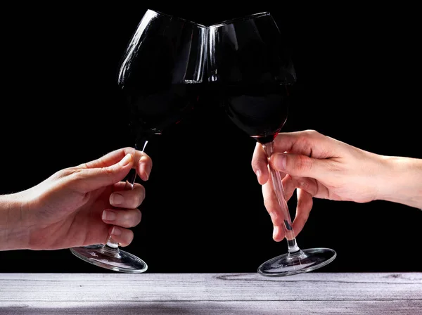 Two Glasses Red Wine Two Hands Toasting Dark Background — Stock Photo, Image