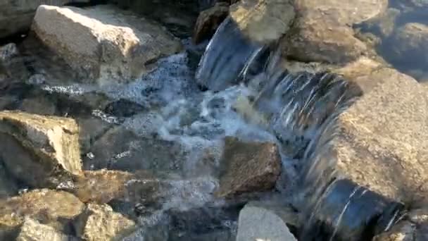 Mountain river flowing swiftly over rocks — Stock Video