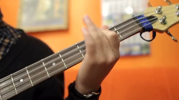 Man playing guitar in recording studio — Stock Video