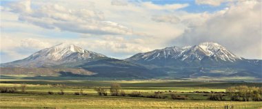 Spanish Peaks are located in Southern, Colorado.  clipart