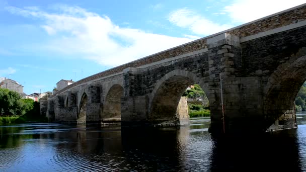 Medieval stone bridge over a river — Stock Video