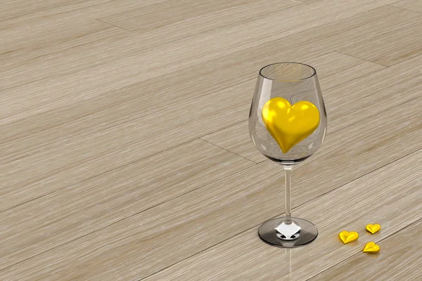 Golden heart in wine glass — Stock Photo, Image