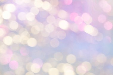 Tasarım için mavi arka planda parlak bulanık tatil bokeh ışıkları