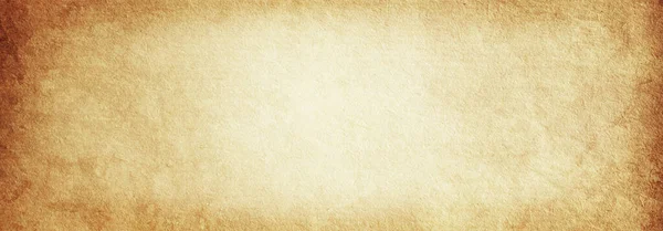 Old vintage brown paper banner background with faded frayed center — Stock Photo, Image