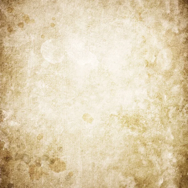 Brown orange background texture of old paper in spots — Stockfoto