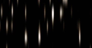 Şenlikli bir tasarım için parlayan altın rengin bulanık parçacıkları düşüyor