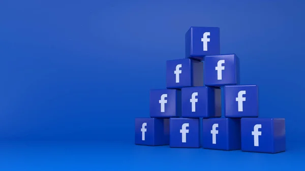 Renderização Uma Pilha Logotipos Cúbicos Facebook Sobre Fundo Azul — Fotografia de Stock