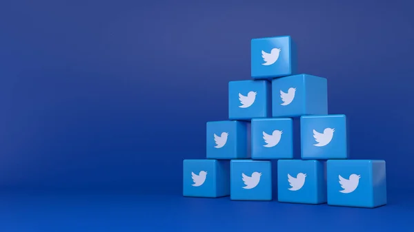 Renderização Uma Pilha Logotipos Cúbicos Twitter Sobre Fundo Azul — Fotografia de Stock