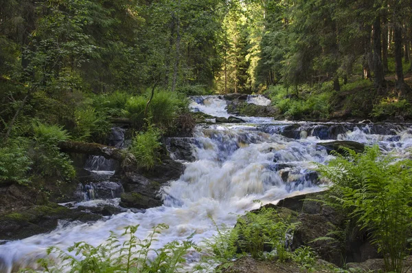 Waterfall. Park of waterfalls on the Ihalanjoki river near the city of Lahdenpohja in Karelia. North of Russia. Tourism in the Russian Federation.