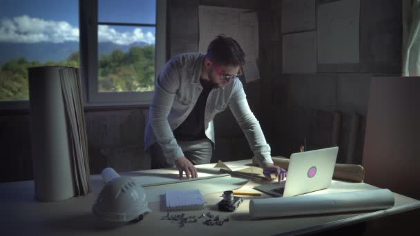 Designer, Architect, works with blueprints. Tools and office for the designer — Stock Video