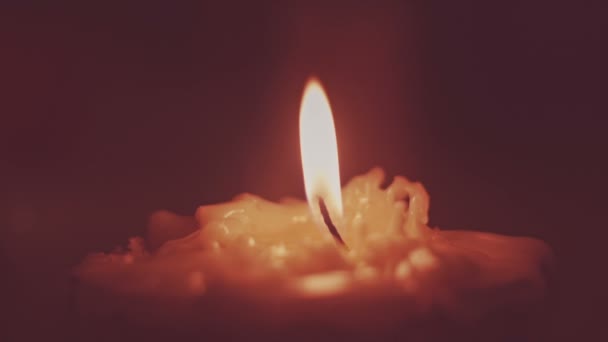 Burning candle in the dark — Stock Video