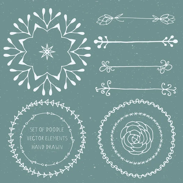 Set de elementos vectoriales florales garabatos dibujados a mano — Vector de stock