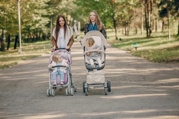 Family walk in the park — Stock Photo, Image