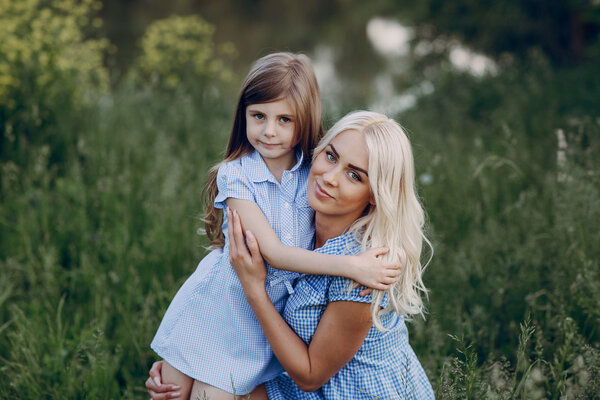 mom and daughter outside